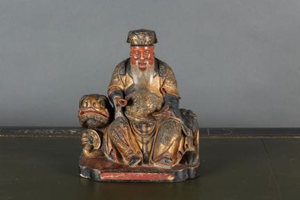 CHINE - XIXe siècle
Groupe en bois sculpté laqué r
