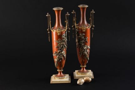 Pair of oblong vases with handles, made of gilded 