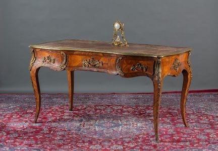 A flat desk in rosewood and violetwood marquetry, 