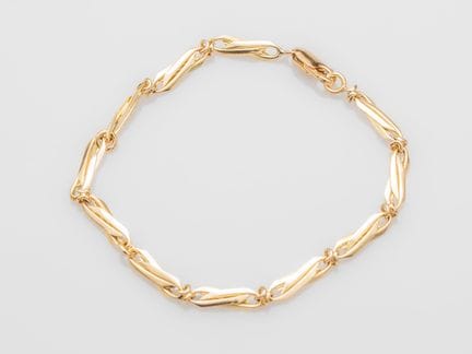 750°/°° (18K) yellow gold bracelet with long, inte