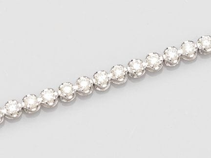 Diamond rivière bracelet in platinum, set with bri
