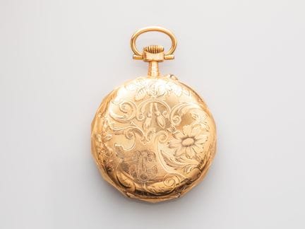Large pocket watch with a case and dust cover made