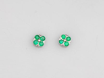 Pair of flower-shaped earrings in 750°/°° (18K) wh