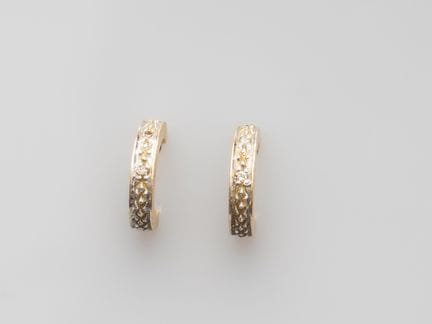 Pair of two-tone 750°/°° (18K) gold half-hoop earr