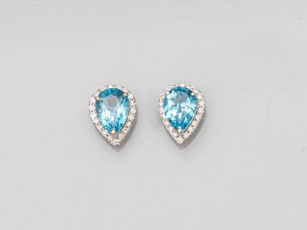 Pair of 750°/°° (18K) white gold earrings, set wit
