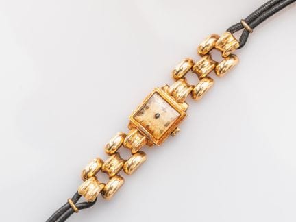Women's wristwatch with a rectangular case and lon