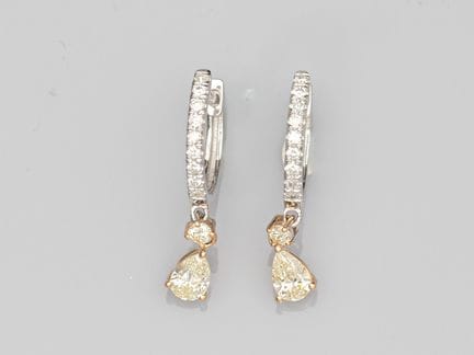 Pair of creole earrings in two-tone 750°/°°(18K) g