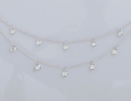 Drapery necklace in 750°/°°(18K) white gold, forme