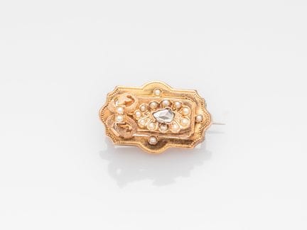 Small matching yellow gold brooch set with a pear-