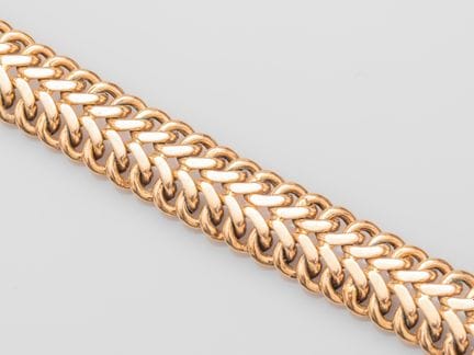 750°/°° (18K) yellow gold bracelet with a braided 