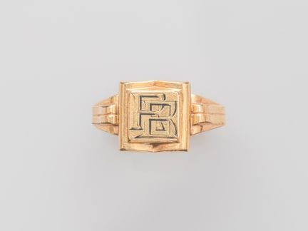 750°/°° (18K) yellow gold signet ring, marked "RB"