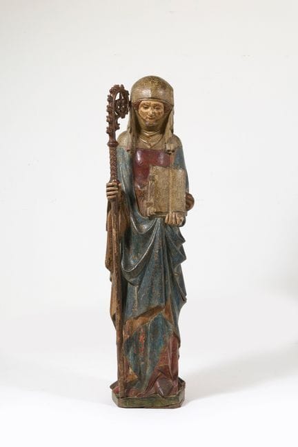 Scultura 
in legno policromo che raffigura molto p