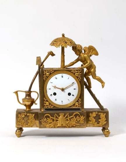 Reloj conocido como «El amor jardinero»
de bronce 
