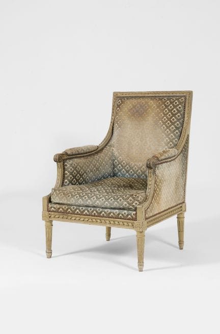 Poltrona bergère
di forma rettangolare in legno la
