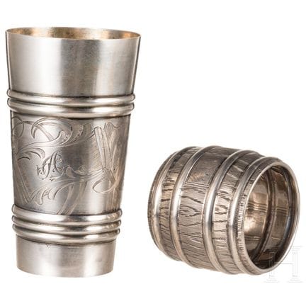 A silver trompe l'oeil salt cellar and beaker, Rus