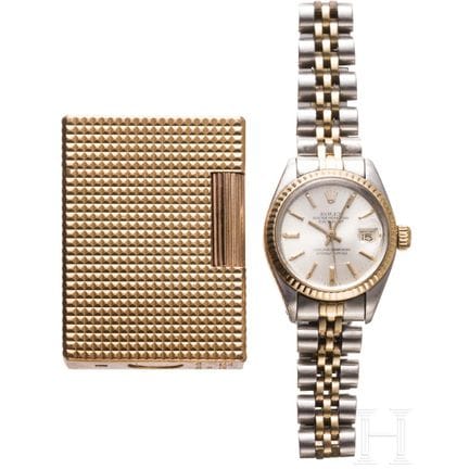 Un orologio da polso Rolex Lady Datejust e un acce