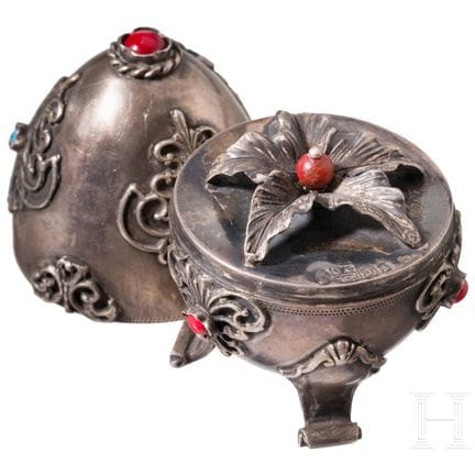 A silver egg set with corals and turquoises, Russi