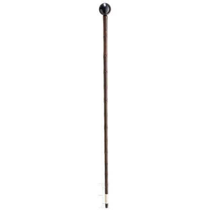 Un elegante bastón de madera, hacia 1900  
Bastón 