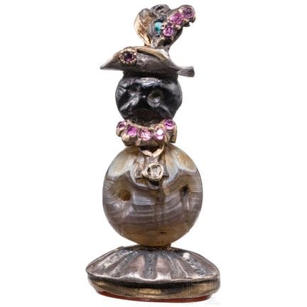 Un pequeño sello alemán ornamentado con forma de «