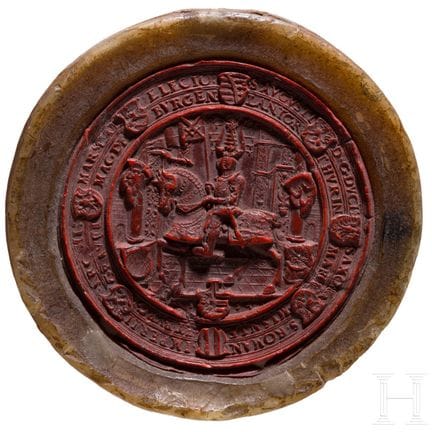 一枚蜡印，萨克森，16世纪  
历史蜡印，中央描绘了一名身着盔甲的骑手，背景为细节丰富的建筑景观。周
