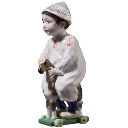 Figurina in porcellana “Bambino con cappellino di 