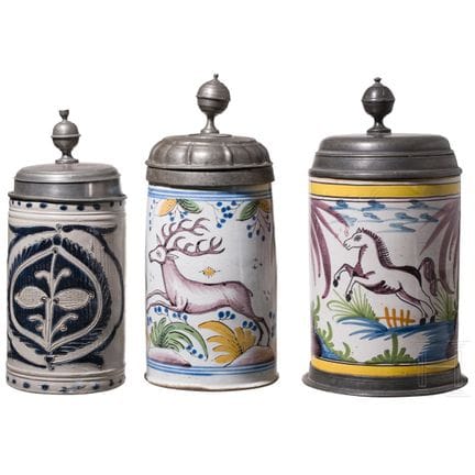 Due boccali in maiolica montati in peltro e un boc