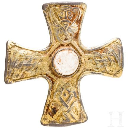 A brooch made of gold-plated silver in the shape o