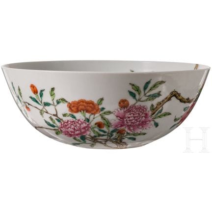 A Chinese Famille Rose bowl depicting bats and peo