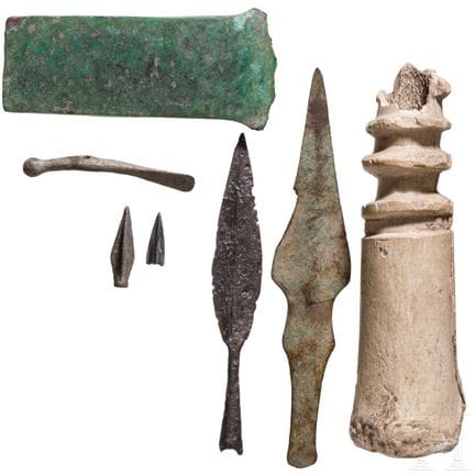 Seven prehistoric and early historic artifacts mad