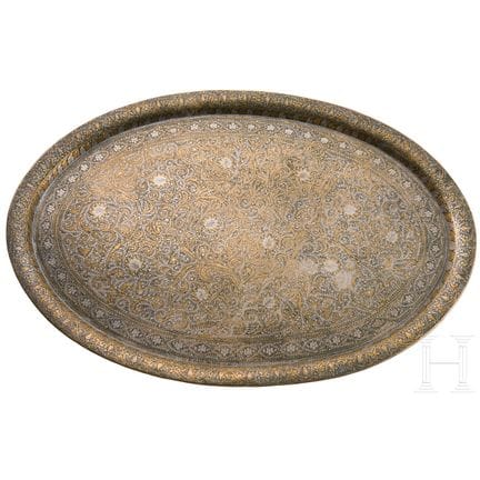 An oval tray with chased decoration, India, Lahore