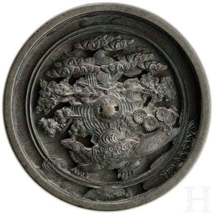 A Japanese bronze mirror (kagami), Edo period  
Br