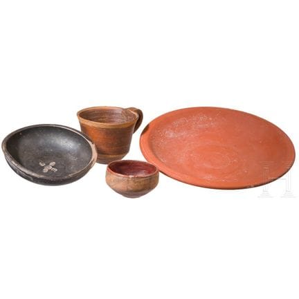 Four ancient ceramic pieces, including a late Roma
