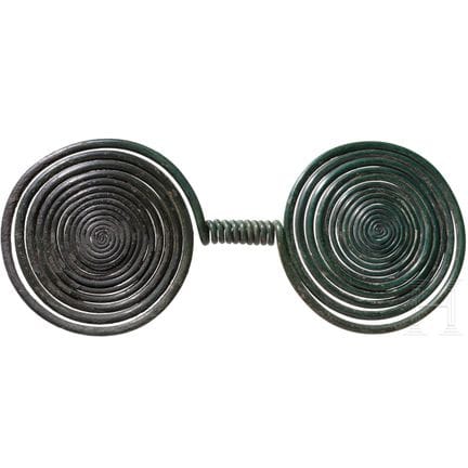 Late Bronze Age double spiral with a dark green pa