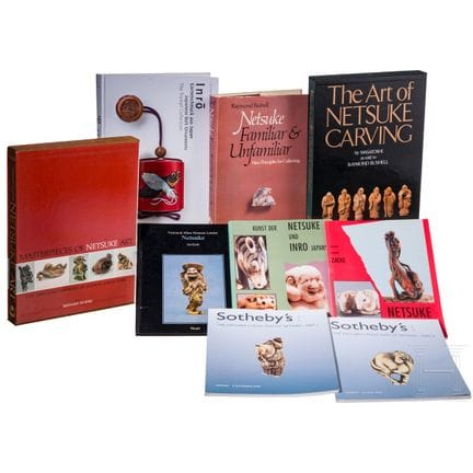 Nine books on netsuke and Japanese belt ornaments 