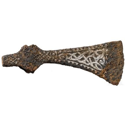 A Viking battle axe made of iron with silver inlay