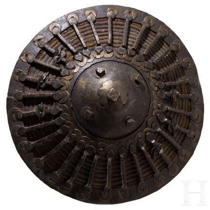 An iron-fitted Caucasian fist shield, 19th century