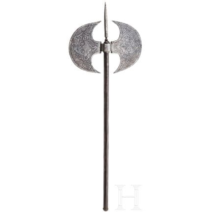 A Persian etched double-headed axe, 19th century. 