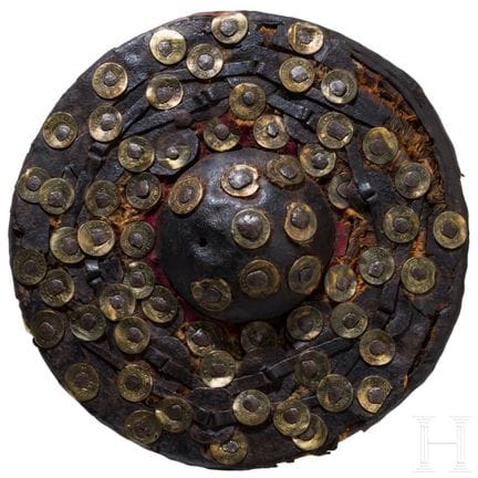 A Caucasian coin-inlaid fist shield, 19th century 