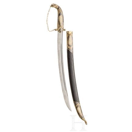 A small sabre with gilt and nielloed silver mounts