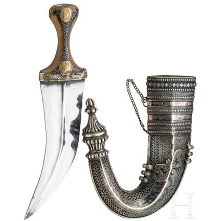 A Yemenite silver-mounted jambiya with rhino horn 