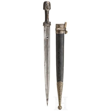 A silver mounted Caucasian kinzal, circa 1900  
Be