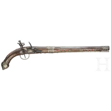 An Algerian silver mounted and coral set flintlock