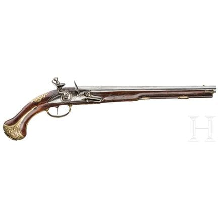 A German Flintlock pistol with a Brescian barrel, 