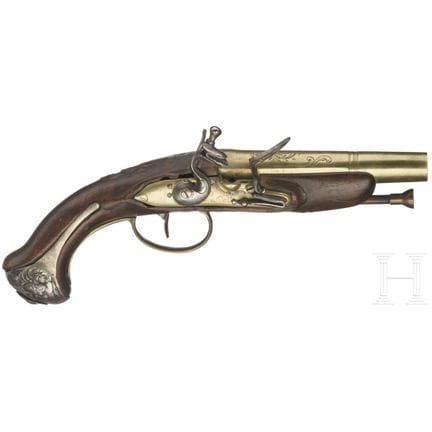 A silver-mounted flintlock pistol, circa 1820  
Se