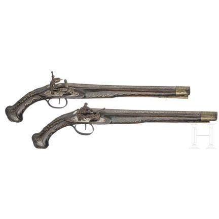 A pair of North African miquelet flintlock pistols