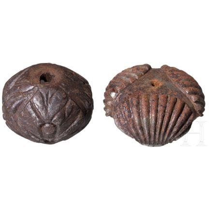 A German and an Italian iron pommel for a campaign