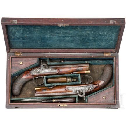 A pair of percussion pistols in a case, Lancester 