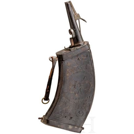 A German musketeer powder flask, circa 1600  
Corp