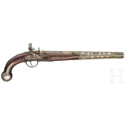 Pistola a pietra focaia con decorazioni damascate 