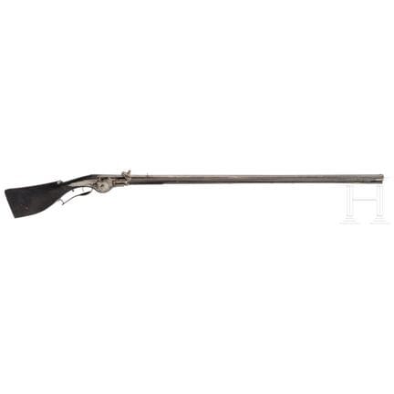 A German military wheellock musket, circa 1660  
R